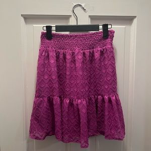 Purple knee length skirt